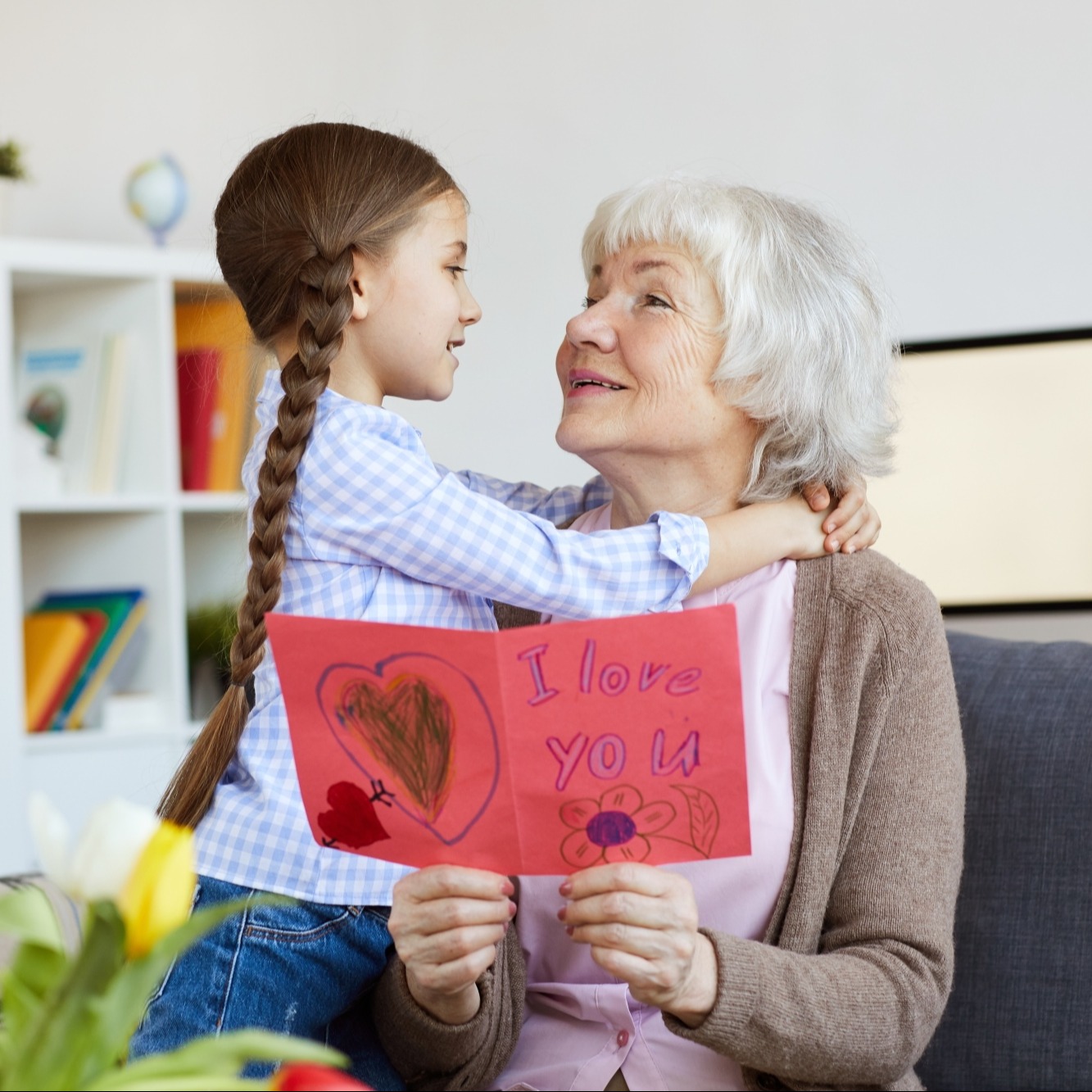 Legacy Woman and child reading card