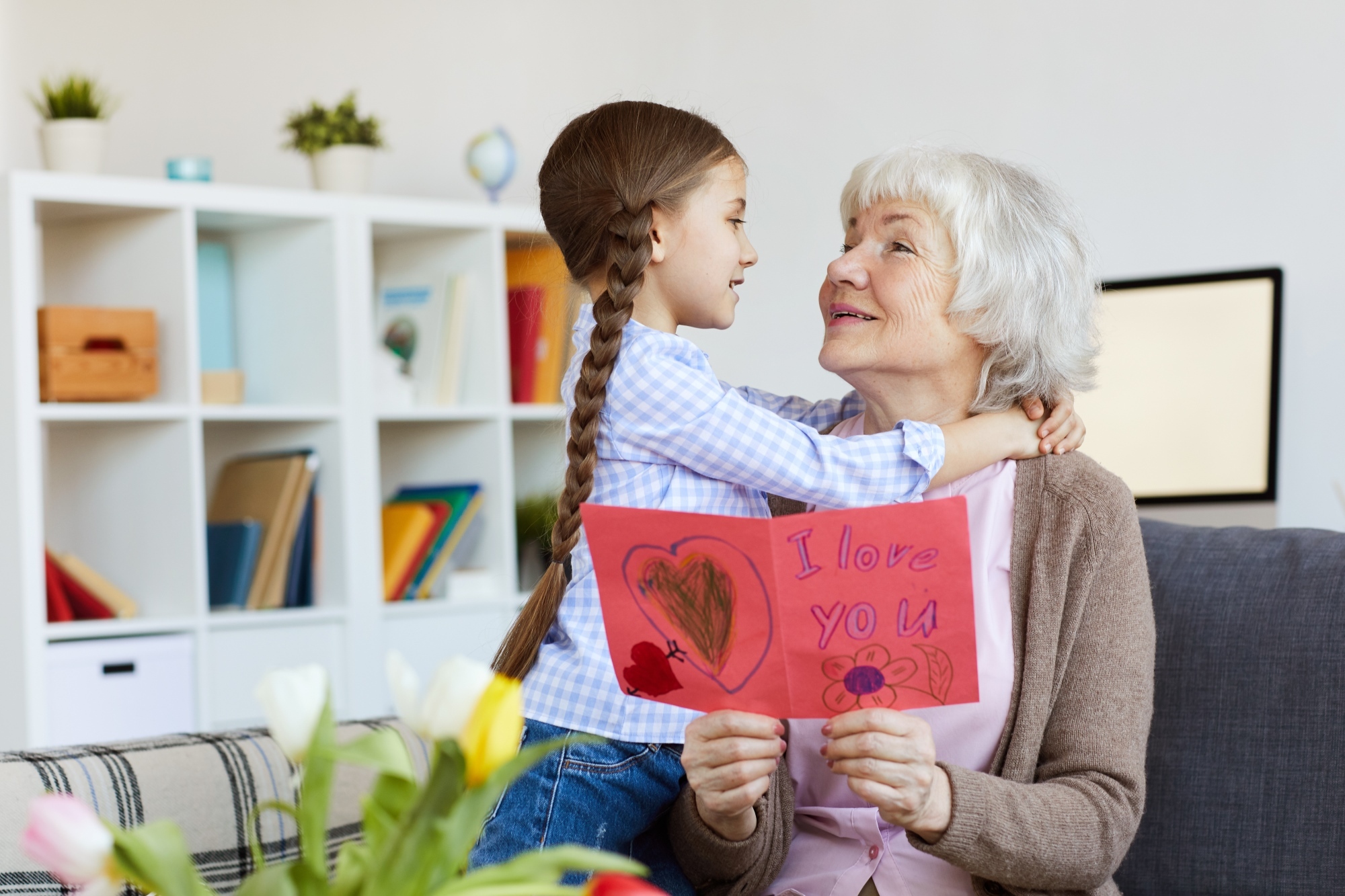 Legacy Loman and child reading card